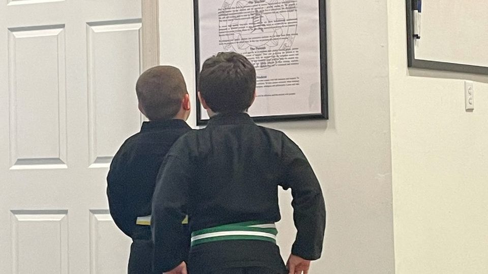 students reading "The Three Spoke Wheel of Success"