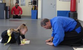 5 year old child in Kids Martial Art class bowing to Sensei (Japanese word for teacher) at Shin Gan Dojo